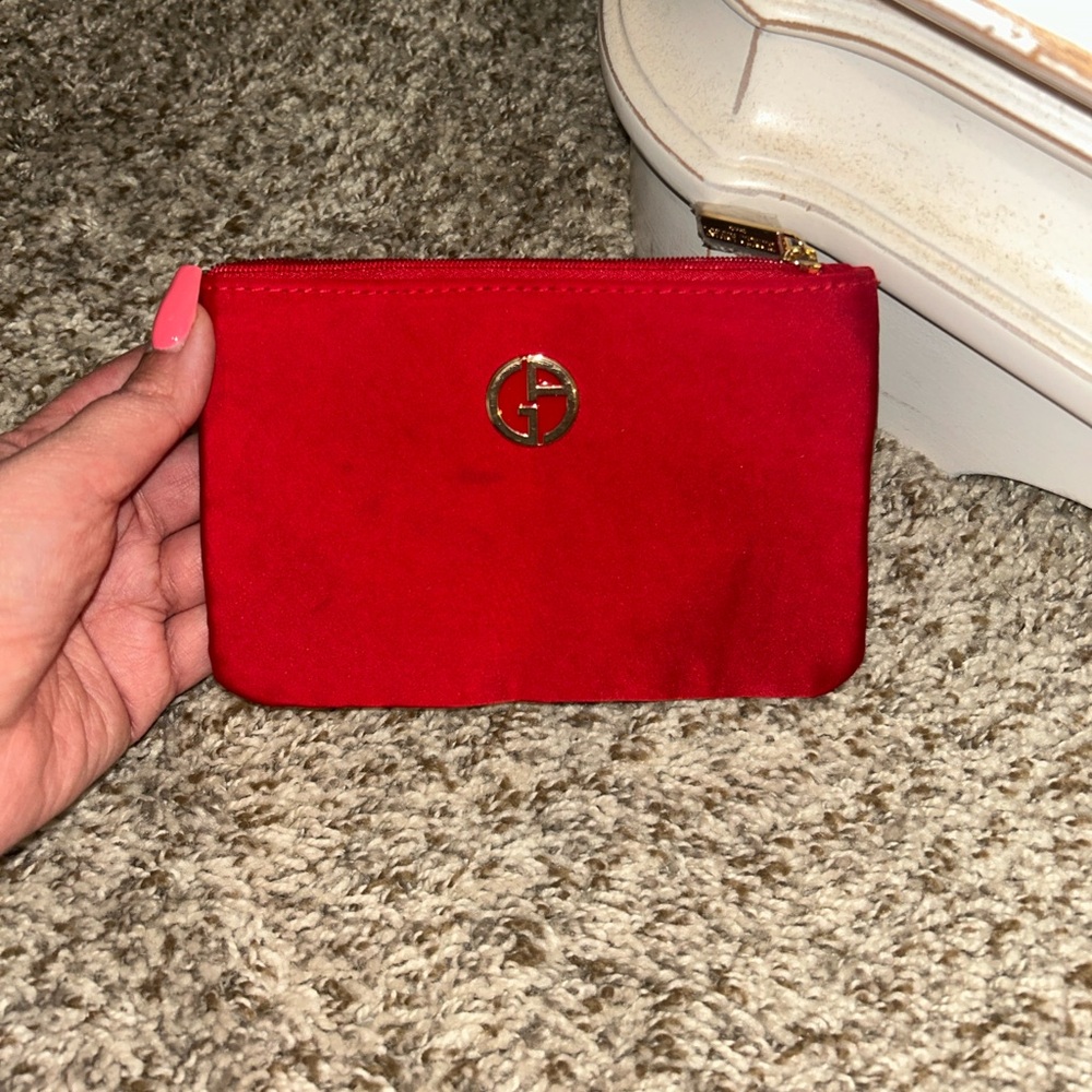 Giorgio Armani, small red makeup bag